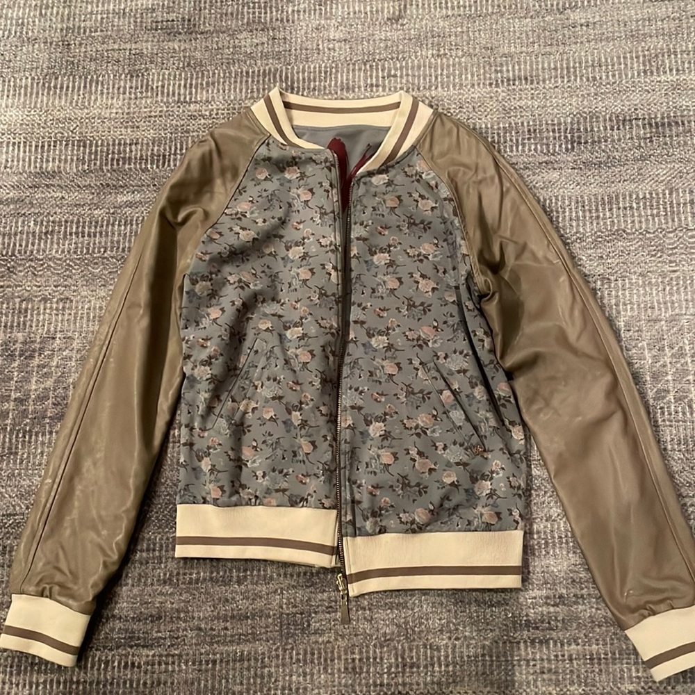 Leather and canvas bomber jacket with floral details